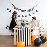 Orange and Black Striped Paper Table Runner
