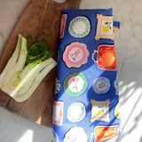 Cotton Tea Towel with Embroidered Detail | Dinner Plates